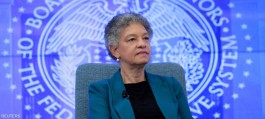 A Federal Reserve official predicts another interest rate hike this year.