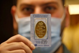 Gold falls as Fed meeting, inflation data eyed