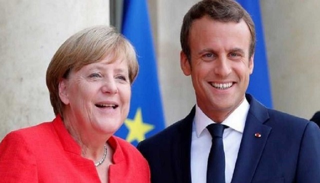ميركل وماكرون يشيدان باتفاق الاتحــاد الأوروبي بشأن صندوق التعافي