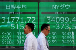 Japan's Nikkei index closes at its highest level in 5 months after the Bank of Japan stuck to its policy