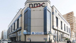 الإمارات: بنوك محلية قد تشطب جزء من ديون "إن إم سي"