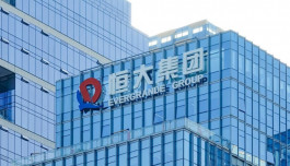 Evergrande sells stake in Huntington