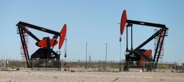 Oil prices fall slightly ahead of OPEC monthly report