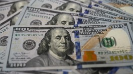 Dollar swings ahead of Fed rate decision