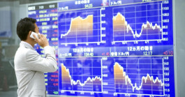 Japan shares close at 3-decade highs