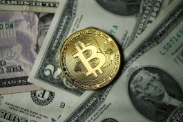 Bitcoin falls below $77,000 as mining economics improve